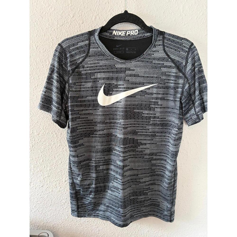 Nike Pro Dri Fit Grey Tshirt size XL. I believe this is a youth boys XL as it se